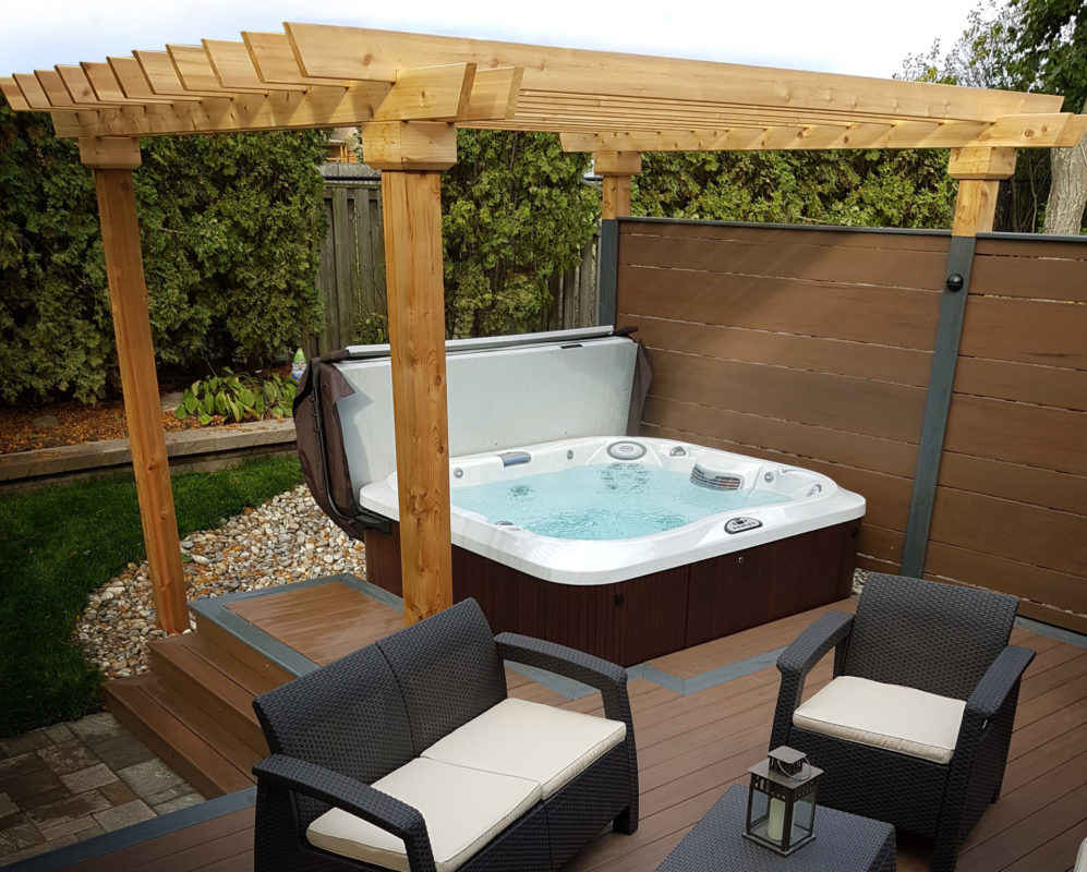 Under Pergola Hot Tub Deck Installation by WCI Pools and Spas Serving Iowa