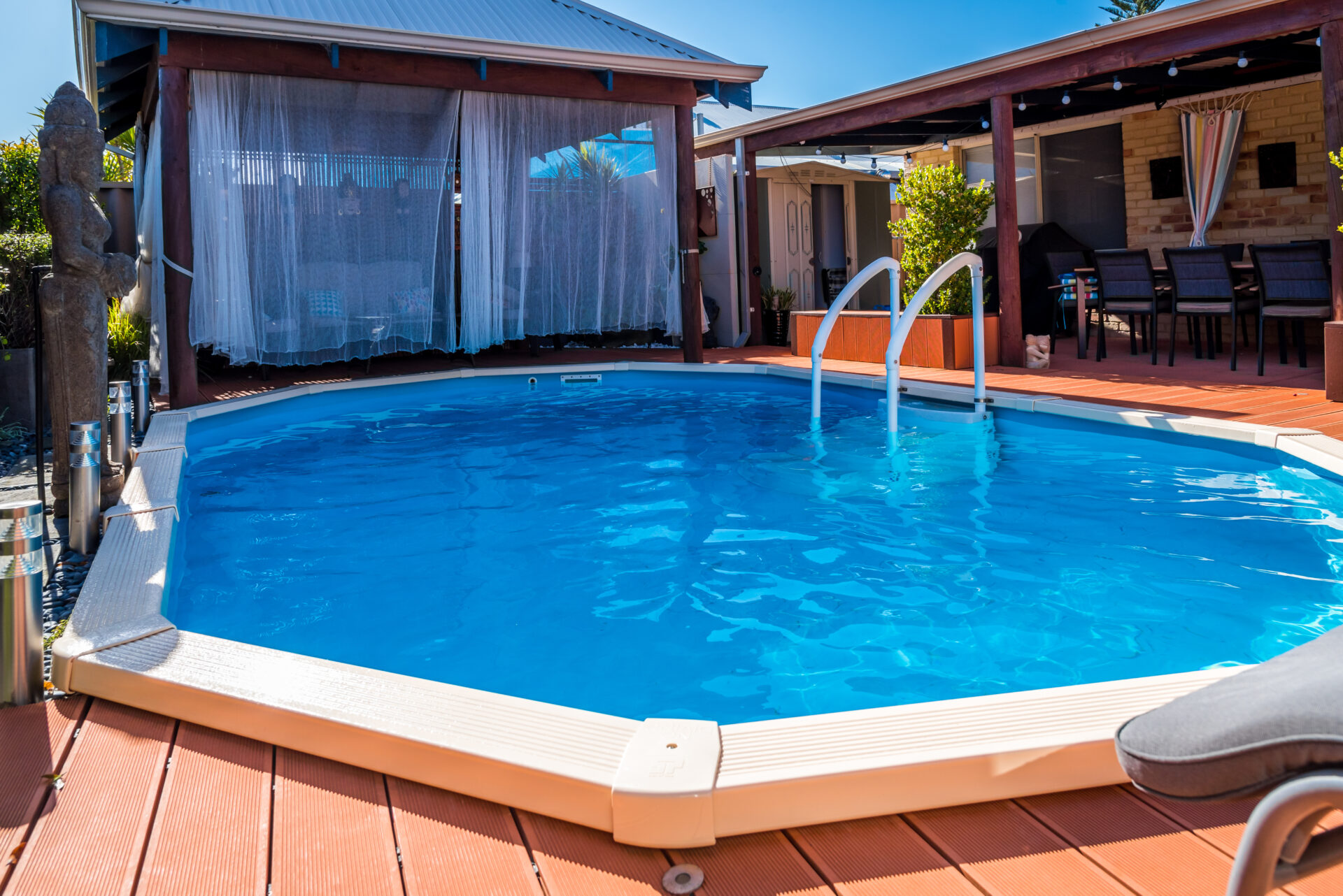 An image of an above-ground pool made of resin.